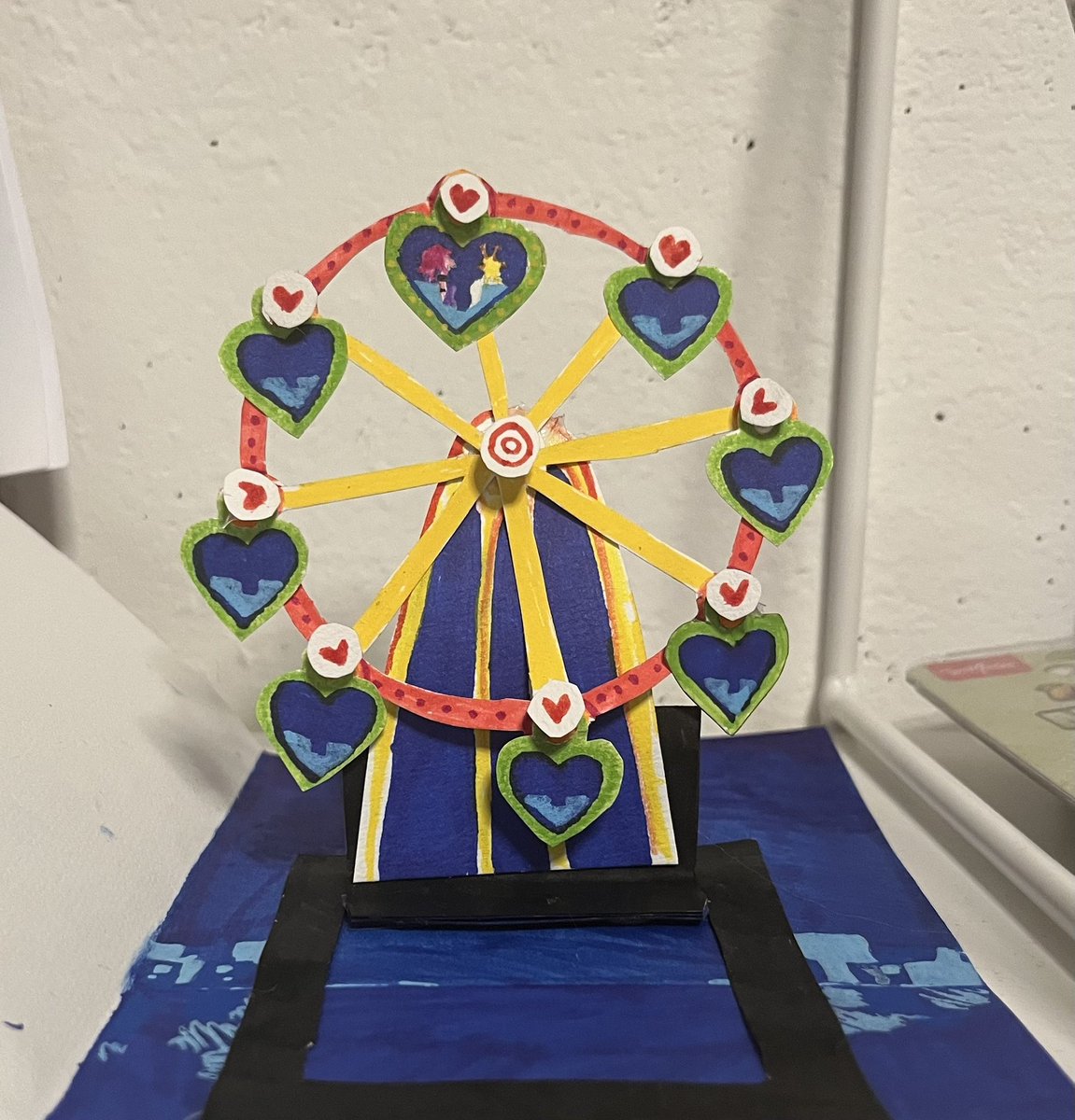 suselle valentines day card i made last year that i still like!! The ferris wheel moves (the carts do as well) and can be pulled upwards