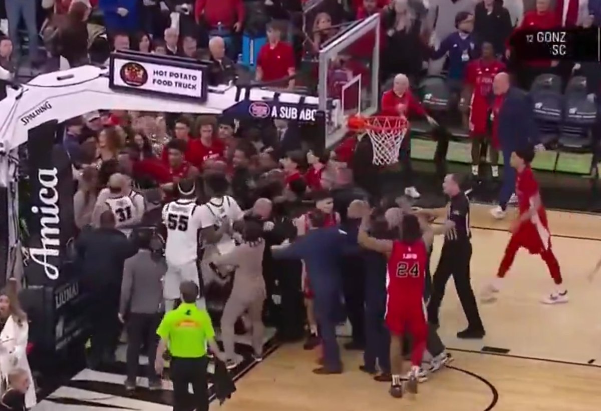 1) Shagman got ball. Connected on the follow thru and w/the body. Common foul. No big deal.

2) Entire St John's team leaves the bench (except one player). Escalates the situation.

Just terrible sportsmanship on St. John's part.