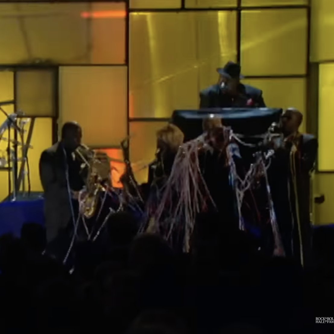 TMATSPodcast's tweet photo. Bold to have the streamers fall during the FIRST song performed at the 19th Rock and Roll Hall of Fame induction ceremony. #Fun #InTheWay #ThosePoorHornPlayers #Prince #RRHOF #LiveMusic https://t.co/yhMmN4fZOR