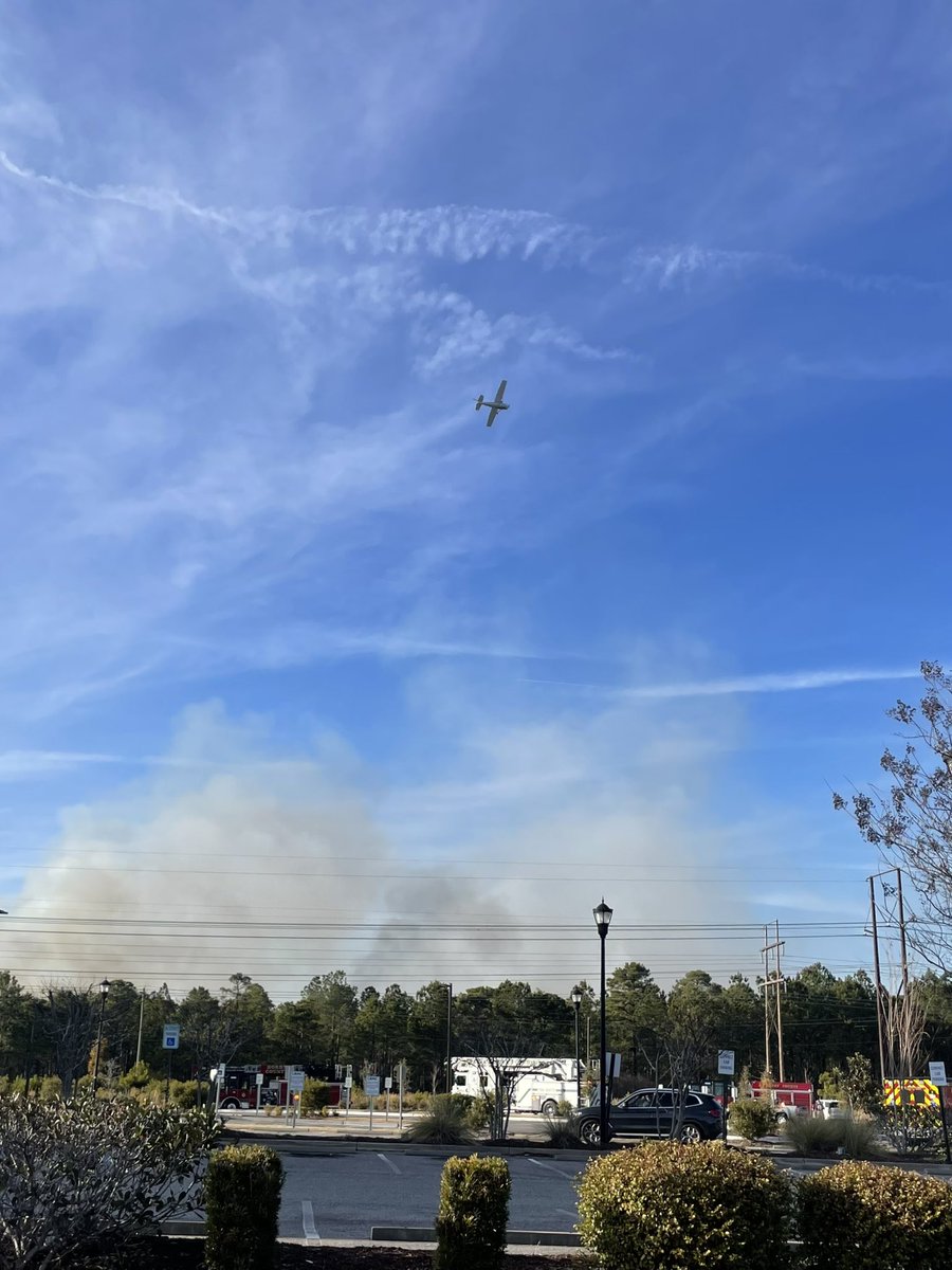 MB_Scanner_Guy's tweet photo. #Horry #CarolinaForest Large Brush Fire in the area between 501 and Postal Way near Renee Dr. HCFR and Conway Fire on scene and aerial operations. Please Avoid the area HCPD has postal Way closed. https://t.co/gz9dor75zb