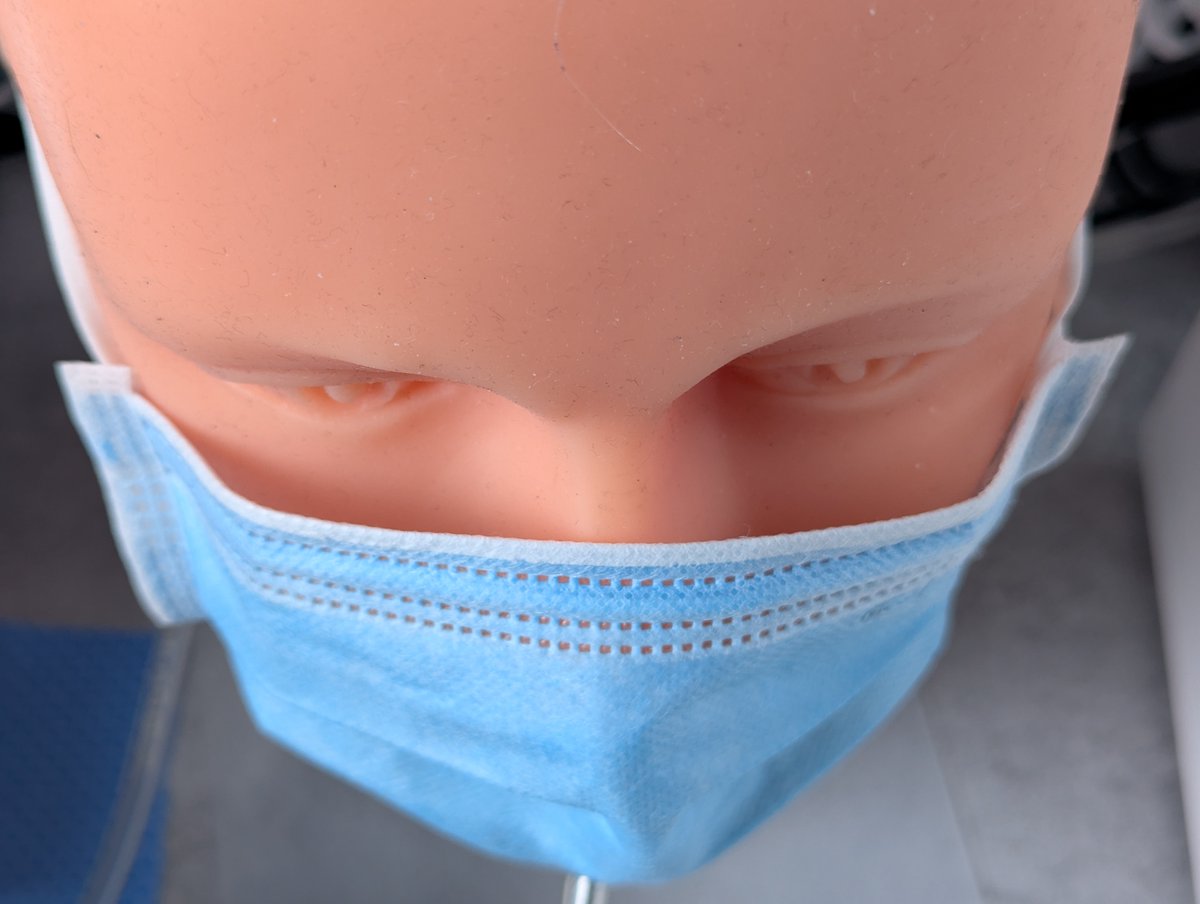 How many times have you seen a mask worn like this, just thrown on without fitting it at all? Does it even do anything?

I did a quick check with a headform mask testing system. While the unfitted BYD surgical mask may block large exhaled droplets, the unfitted mask did not