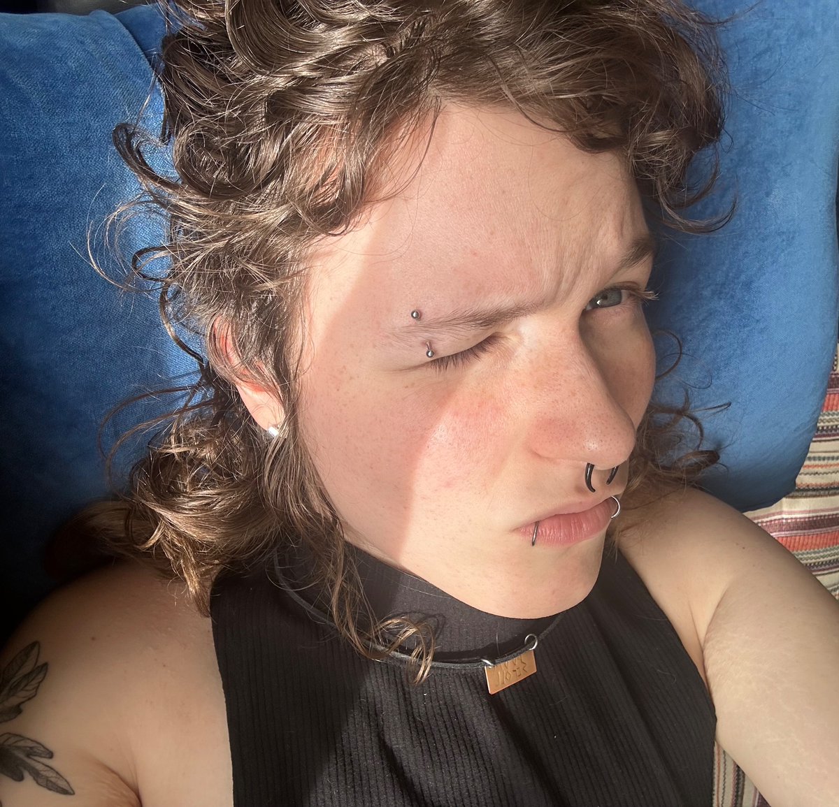 the sun hurt my eyes but i love how big my nose looks :>