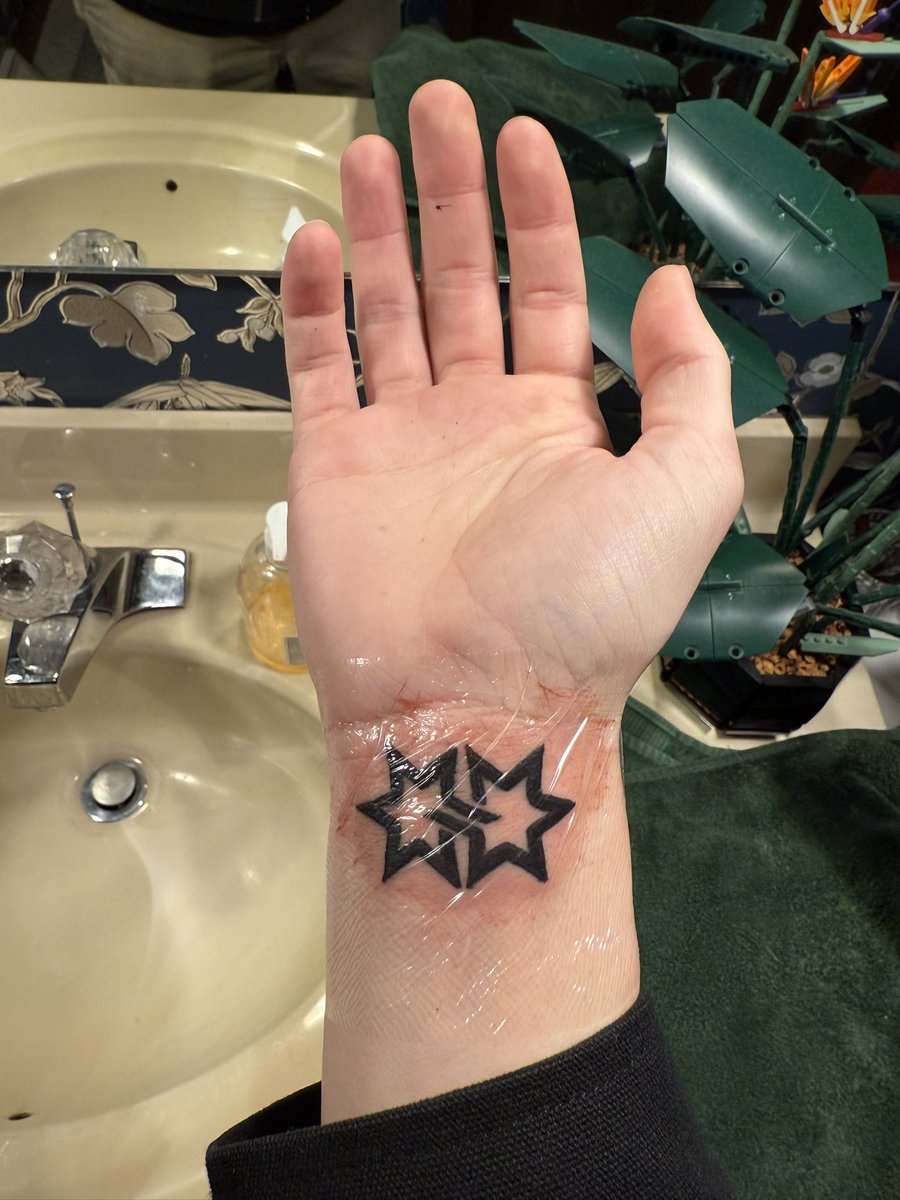 therealcshuda's tweet photo. @bbjuelz Happy Valentine’s Day 

   My boy and I got matching tattoos to honor the king himself https://t.co/gOy5mUWgZq