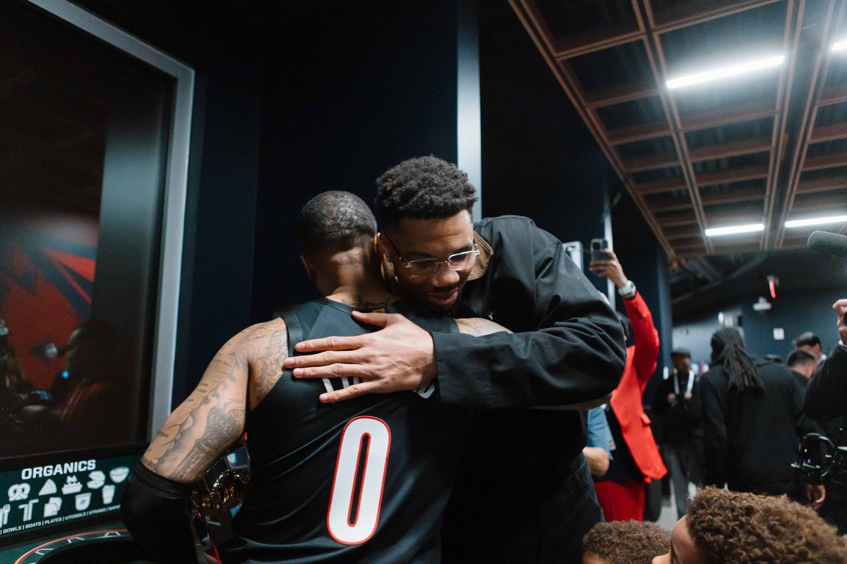 trailblazers's tweet photo. Former teammates 🤝

(Sorry Giannis, this trophy is his!) https://t.co/WjyVfPXFMH