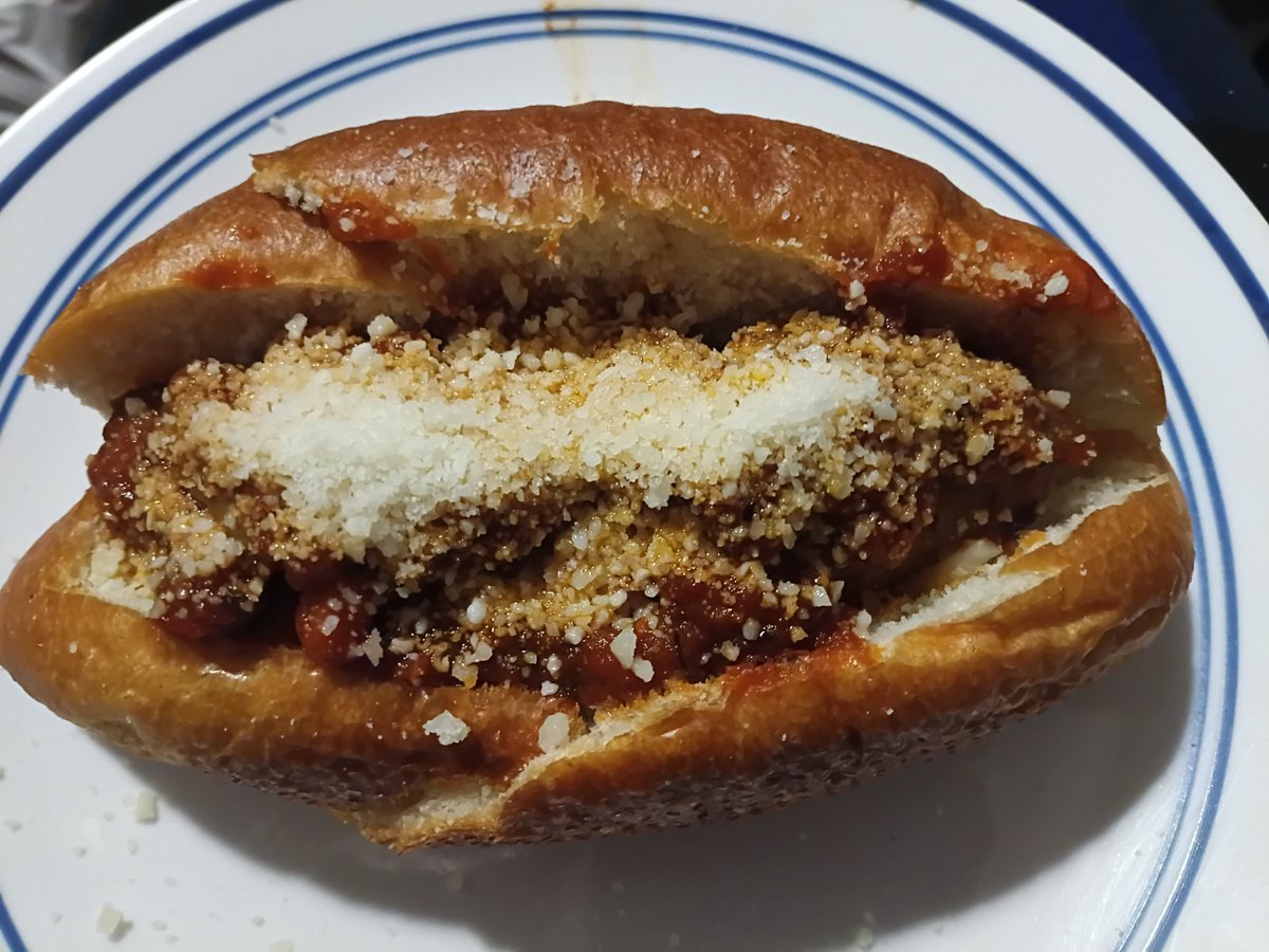 Family made sweet Italian sausage and bell peppers I added some low moisture mozzarella and pecorino romano cheese