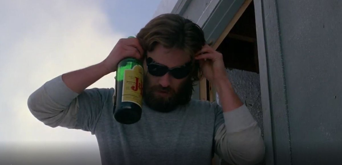Cool theory: MacGready filled the bottle of scotch with gasoline like he did all the other bottles. The Thing wouldn't know what gas tastes like. So when he takes a swig after MacGready and doesn't make a face, MacGready knows.