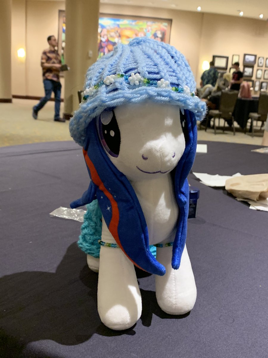 CfudDinner's tweet photo. Just in case, can anyone at @HarmonyPonyCon try to find or have found a yarn beanie and a flower crown headband alongside it by chance? I can’t find it and I worry it fell off somewhere yesterday. https://t.co/x2aDCf86ue