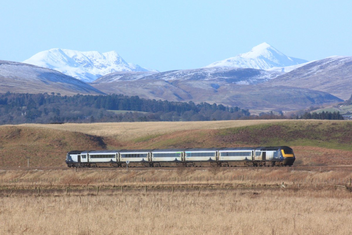 TimonFrancis's tweet photo. Snow-capped mountains Stuc A'Chroin and Ben Vorlich with @ScotRail Inter7City HST on Inverness to Glasgow Queen Street service @Rail @RAILMag @rnbowker53 @railnigel https://t.co/RoGG91E1gt