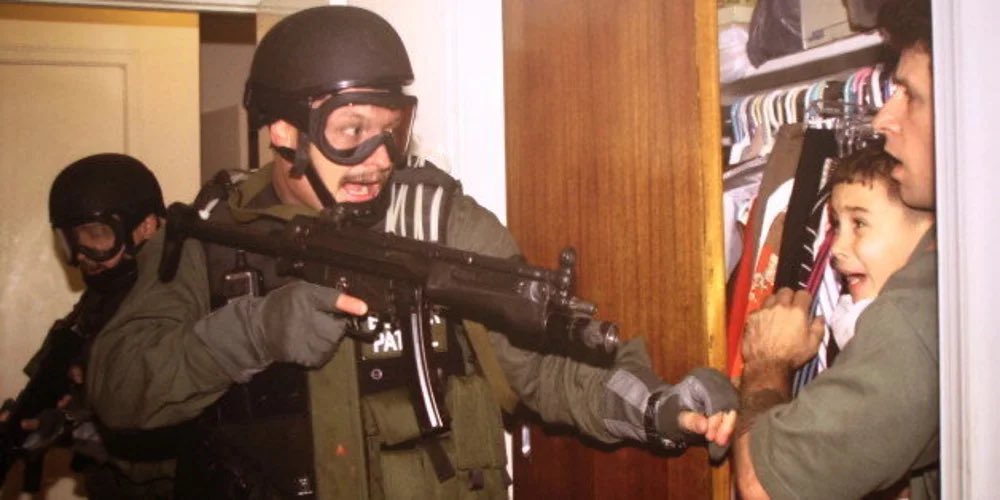 This is ok? This is Bill Clinton’s FBI pointing a sub machine gun at a 6 year old boy so they could abduct him &amp; send him back to Cuba. 56 illegals died in detainment under Obama. Jo, the lying cunt just has emotional one offs to post so she can get paid.