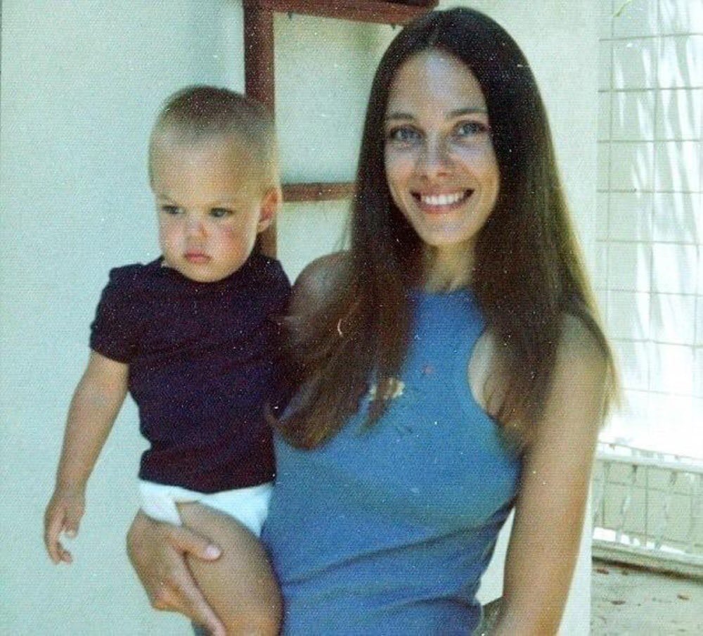 dqveed's tweet image. A young Angelina Jolie with her mother, 1970s.