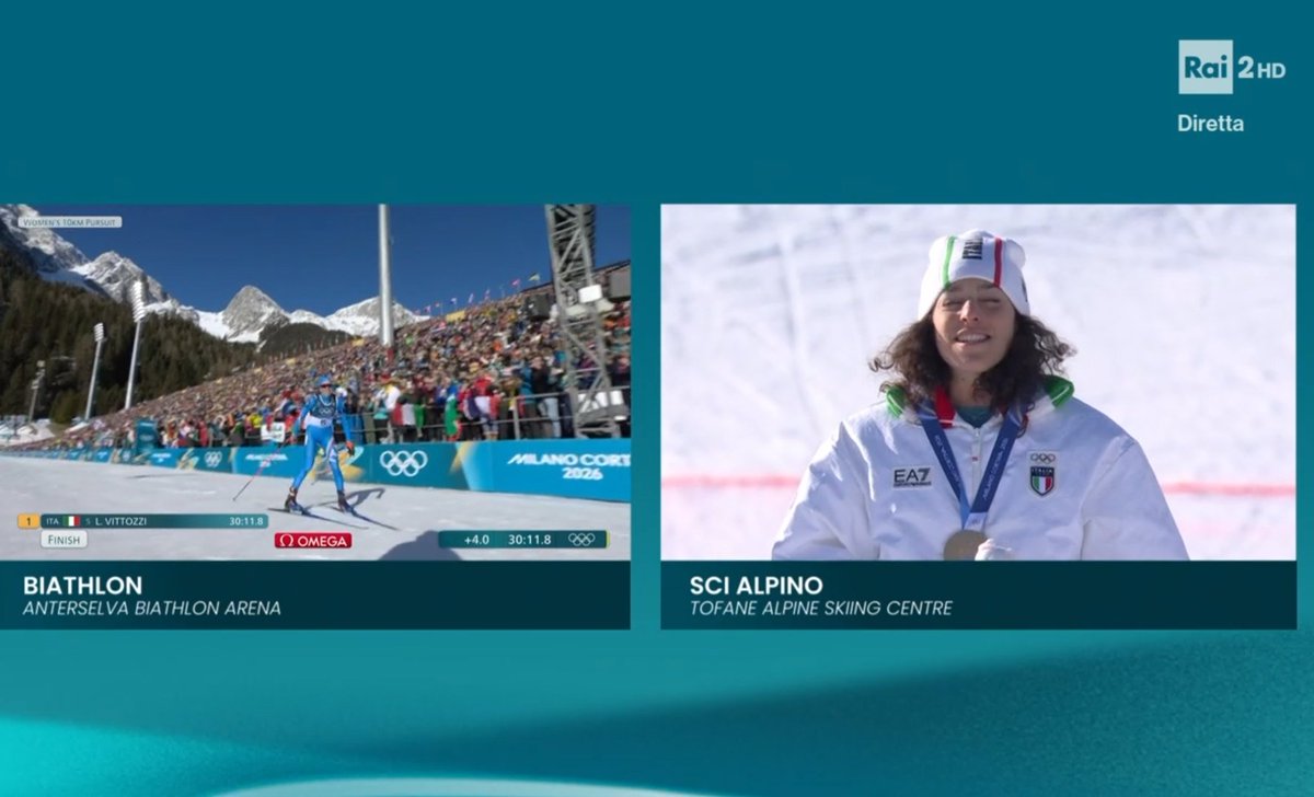 Lisa Vittozzi che arriva al traguardo per l'oro e IN CONTEMPORANEA Federica Brignone che canta l'inno. LA POESIA DI QUESTA COSA