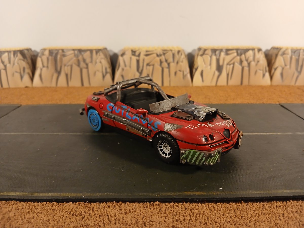 RoadWarriorJohn's tweet photo. #newray #alfa #romeo #spider #apocalypse #apocalyptic #wasteland #diecast #custom

Finished the Apocalyptic Alfa Romeo Spider, inspired by the Convict's vehicles from the PSP game Pursuit Force.  Diecast is a New Ray 1/32 Alfa Romeo Spider. https://t.co/pofNB3Llex