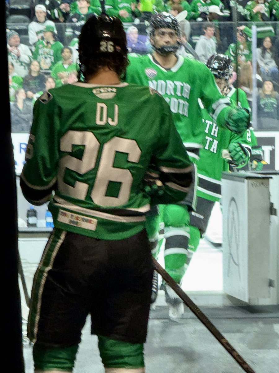 TheREA's tweet image. The Kids Takeover 🖍  jersey auction runs through Tues, Feb 17.  Bid on limited-edition UND jerseys that feature each player's childhood nickname, commemorative patch &amp;amp; were worn by the team during pregame warmups.
Learn more and place your bids at: pd.undalumni.org/jersey
