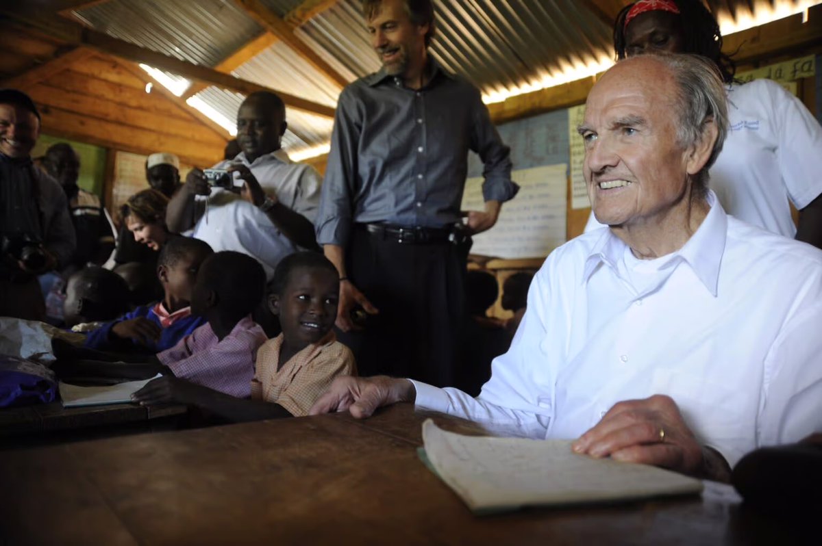DailyMcGovern's tweet photo. McGovern back in school as a student in a classroom in Western Africa, part of a food distribution tour across the region https://t.co/owcWc0rhHN