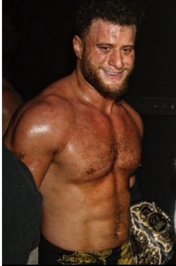 AEWsDevilMJF's tweet photo. Here’s some AI generated slop to make it seem like I was smiling after my matches. https://t.co/0q7uPUPxUo