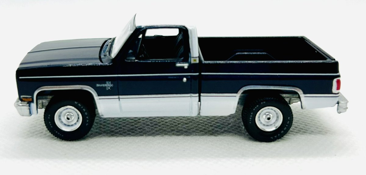 Auto World 1985 Chevy Silverado 10 Fleetside. Muscle Trucks Release 5, Version A, #3685/2185 Dark Blue Poly/White

In 1985, the 4.3L Vortec V6 engine was introduced. It had the same bore &amp; stroke of the 350ci small block V8. The similarities gave it the nickname “3/4 small block”