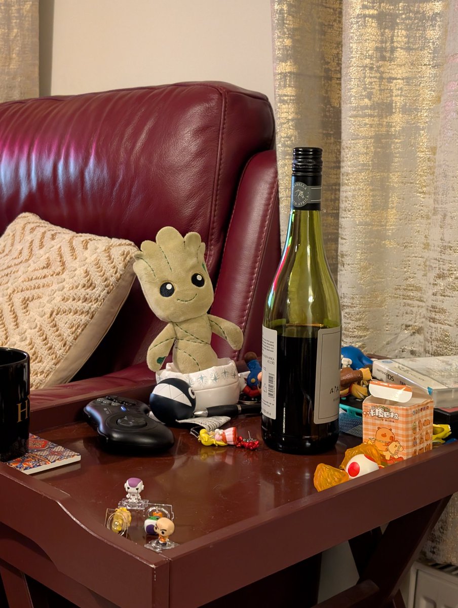 DarrellBlake's tweet photo. Groot is really admiring this bottle of wine. https://t.co/f4I7hQgPZM