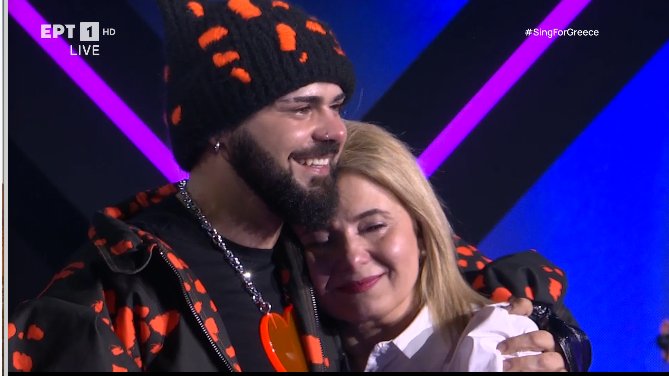 Akylas mom looks to be such a sweet woman. I am well guaranteed he'd be able to get all that his and hers hearts desire, now that he's won. Like his song promised. #singforgreece