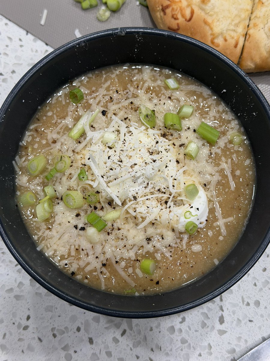 Was a nice day out but cold ! Wife made a really good soup with roasted cauliflower and garlic . And some cheese pitas to go along . Added cheese and sour cream to the soup with green onions . It was delicious perfect for a cold sunny day