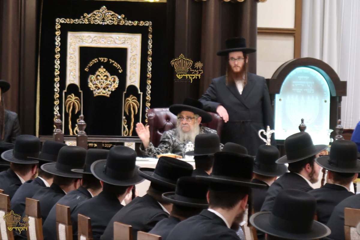 HQSatmar's tweet photo. At the historic Shul in #Sighet #Romania, Satmar Grand Rebbe Aron leads the 122nd #Yahrtzeit Tish in honor of his grandfather, Grand Rabbi Chananya Yom Tov Lipa Teitelbaum OBM (1836-1904), the Kedushas YomTov. A profound moment celebrating the legacy of the #Siget #Satmar dynasty!