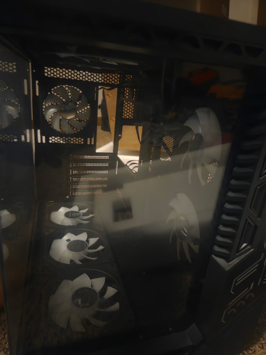 Everybody I'm over here trying to see if I can get my new computer stuff into this brand new case I bought. More space to work with and hoping everything goes smooth so many fans in here to make the computer say nice and warm while feeling like it's heating up too much I'm happy.