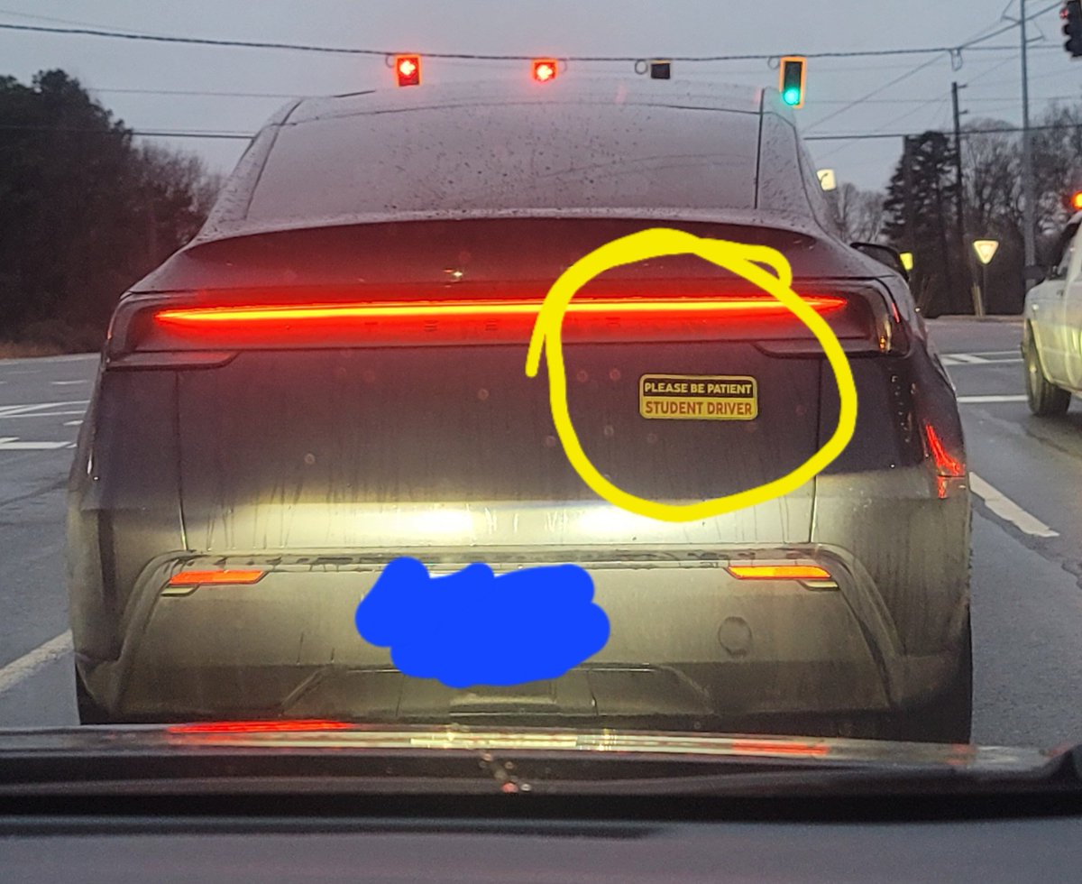 The car in front of us is a student driver...driving a Tesla, lol.