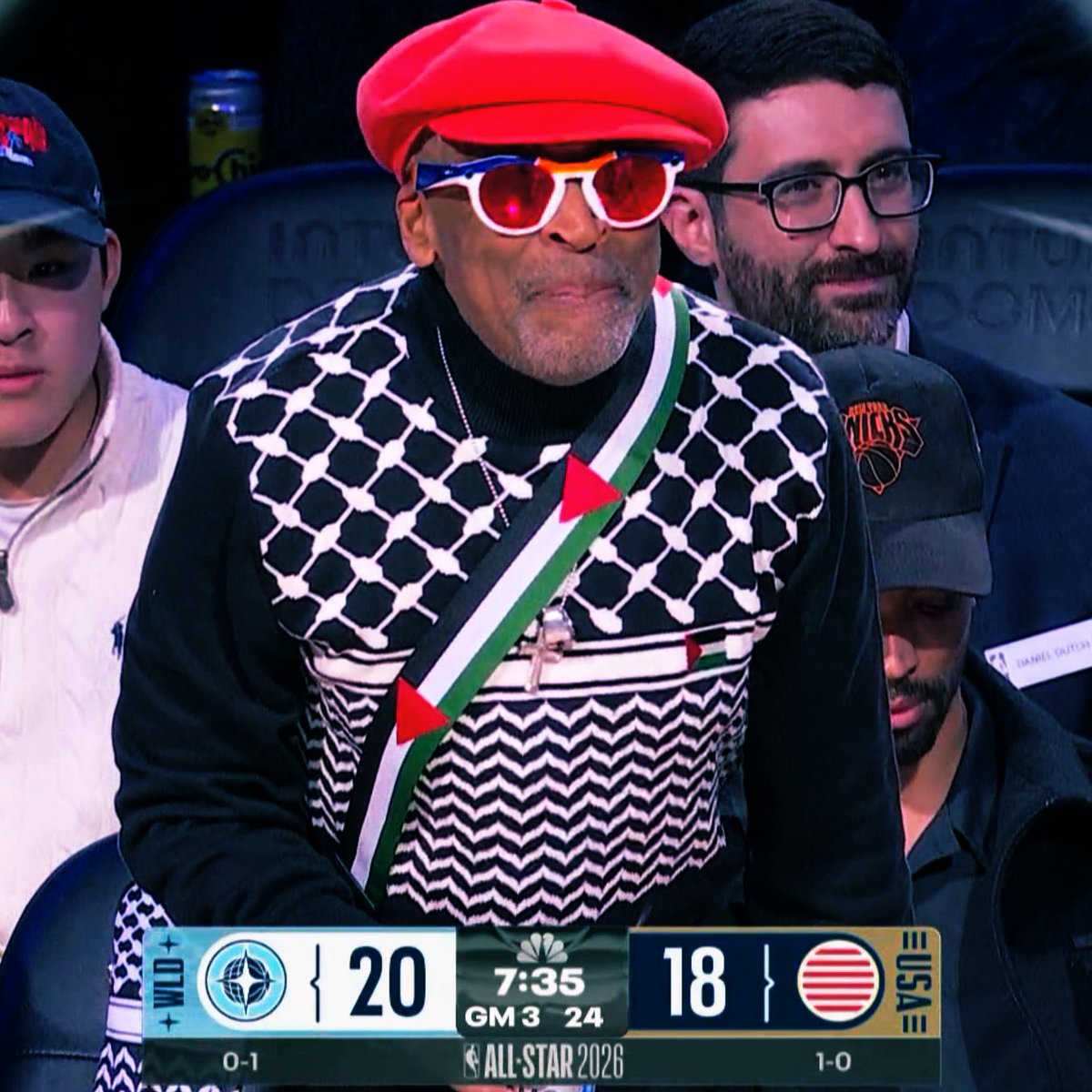 Spike Lee courtside at the All-Star Game wearing Palestine flag