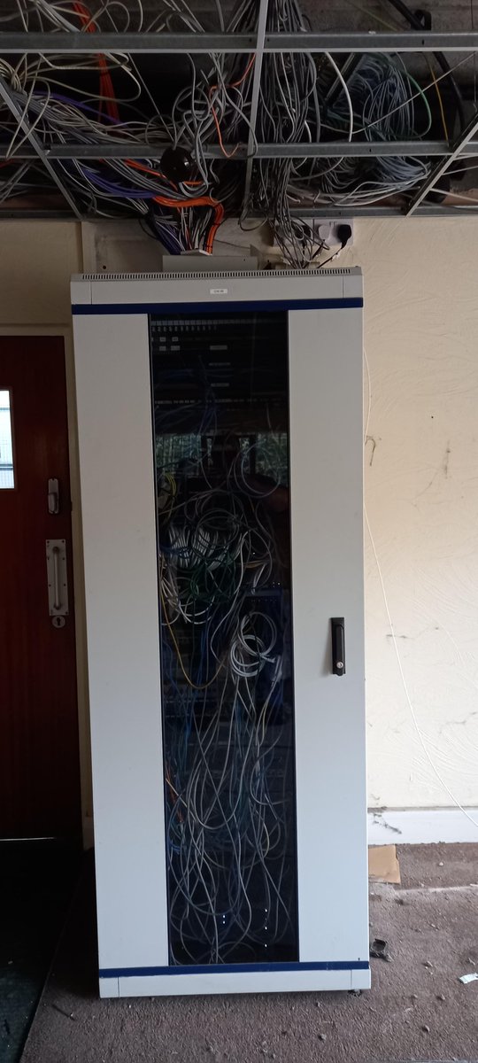 cqcqcqdx's tweet photo. Contractors have taken down the roof above a cabinet, showing the gore installed by the previous IT team... https://t.co/jwSkqVMANm