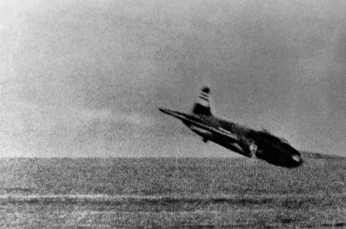 G4M1 bomber of Japanese Navy 4th Air Group commander Lieutenant Masayoshi Nakagawa, moments before crashing into sea during attack on USS Lexington off Bougainville, Solomon Islands, 20 Feb 1942.