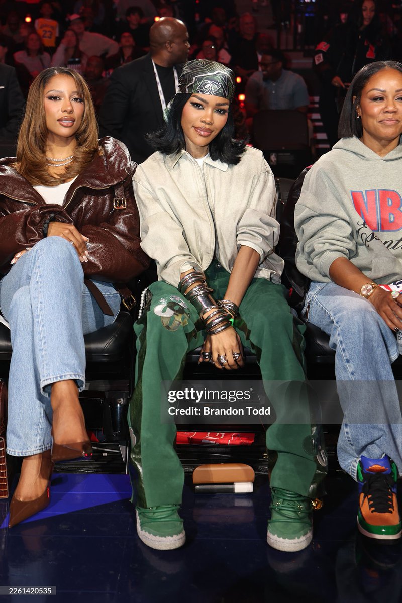 Victoria Monét pictured alongside Teyana Taylor and Eboni Nichols at the NBA All-Star Game