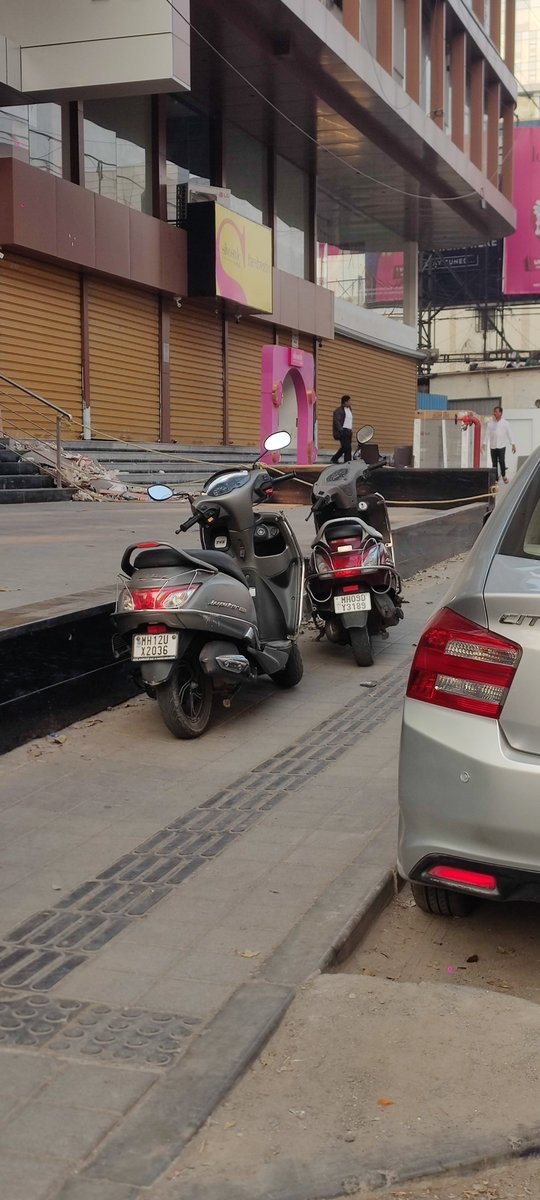 mrpatil's tweet photo. @PuneCityTraffic Parking on the footpath. Location: Baner 16Feb 2026 8AM https://t.co/L8eNtjeb8e