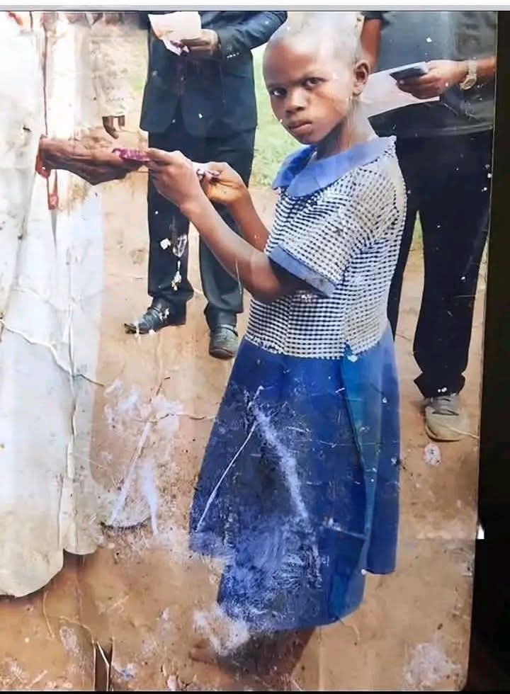 See picture posing. She must have grown into a beautiful lady by now. Please if you're the one in this picture indicate let's celebrate you.