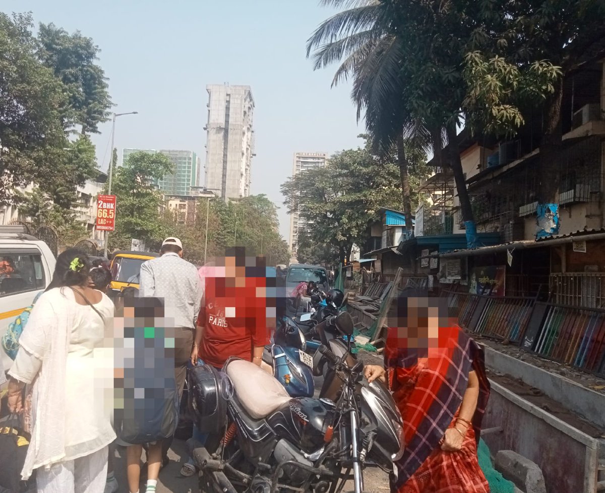 The chaotic scene outside my son's school, where the only footpath has been completely disembowelled. Parents and kids are forced to walk on a congested road as vehicles whiz by just inches away. <a href="/NMMConline/">Navi Mumbai Municipal Corporation</a> does this look safe to you?