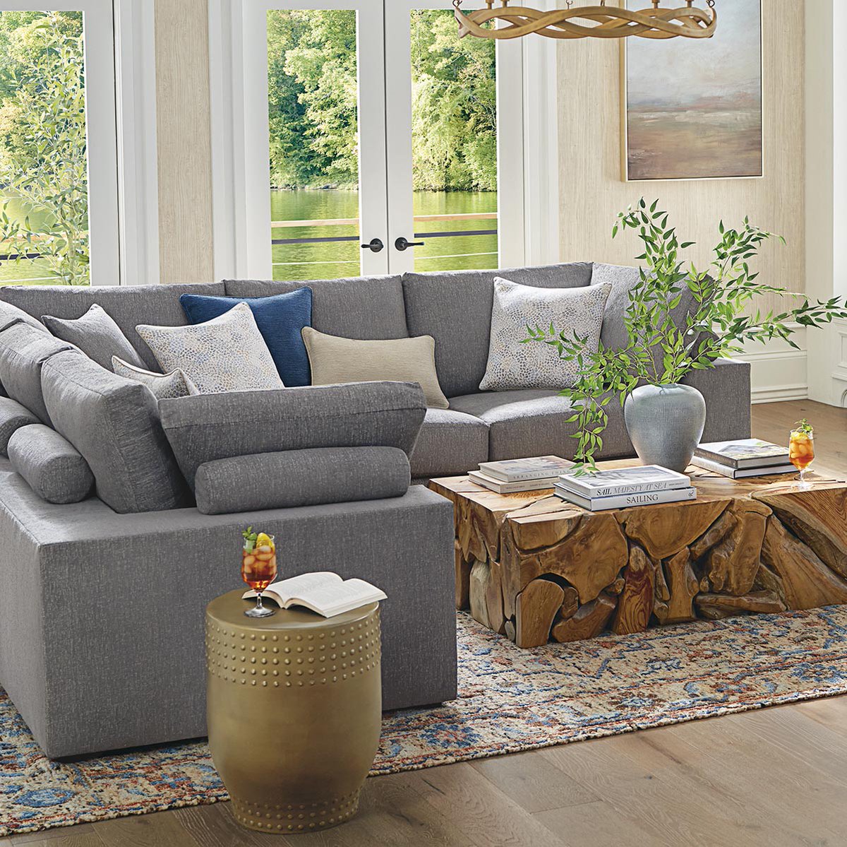 Stay cozy: As we await higher temps, keep enjoying the flickering fire. We love the organic-modern look of this space, spotlighting our spacious Declan Modular Sectional. bit.ly/4sR136V