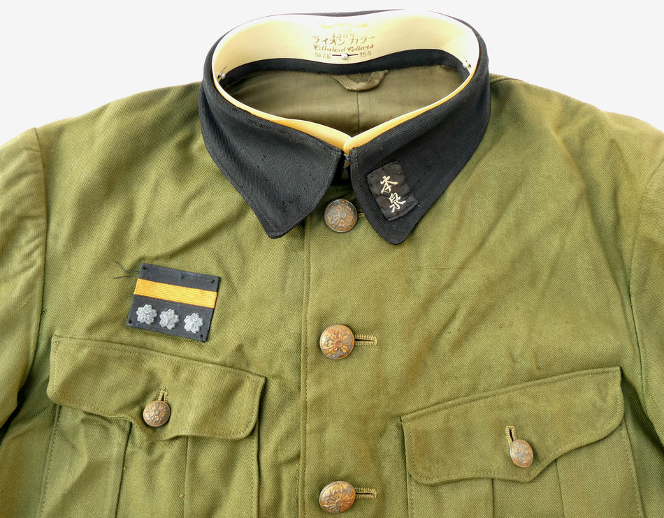 警防団の制服上衣になります。 警防団の襟章を外されて、 消防団の胸章