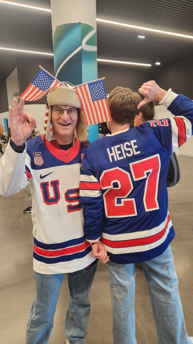 isualum's tweet photo. Iowa State alum Sam Strotman (‘86) is cheering on Team USA 🇺🇸 at the Olympics in Italy and ran into another Cyclone fan! @CycloneMBB senior Nate Heise’s sister plays for the women’s hockey team and his mom Amy was so excited to see a #CyclonesEverywhere flag! https://t.co/W1WoUMJw28