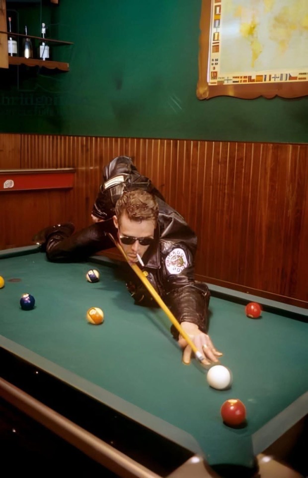 Andrew Eldritch of The Sisters of Mercy, playing pool. Photo taken in Hamburg in July of 1992.