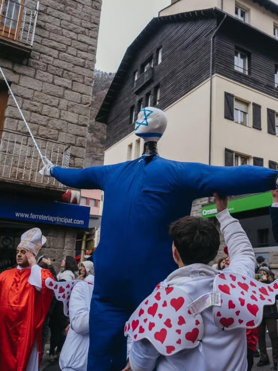 HeidiBachram's tweet image. During a festival in Andorra an effigy of a person representing Israel was put on mock trial, hanged, shot and burned. See the huge Star of David on its face and you can just make out a strip under the chin. So they can pretend this was just about Israel and not violent Jew-hate.