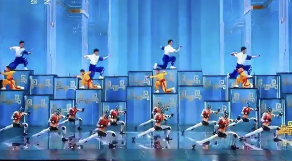 The "Silicon Shackle": Stolen Fire and the Choreography of Submission

On this Chinese New Year’s Eve, as the crimson glow of celebration masks a colder reality, a high-tech myth is playing out on television screens. A troupe of metallic carcasses gleaming with the polish of