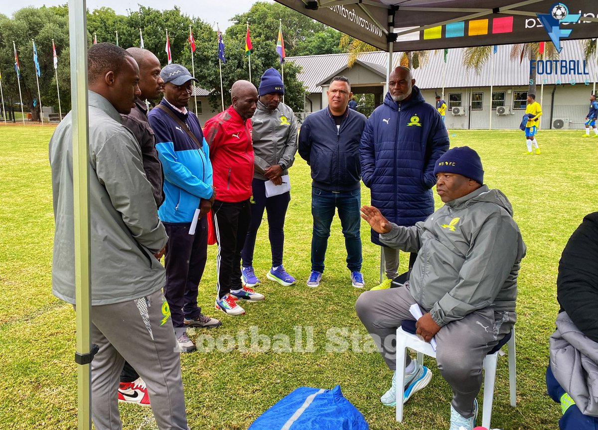 The Great Sir Sam Mbatha having a chat with Mamelodi Sundowns scouts from various provinces.