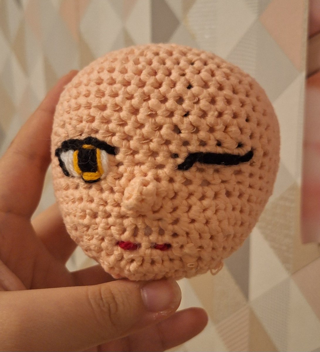 Miya's head is almost done just ears and eyebrows left also I couldn't make her second eye so I made her wink I hope she will look better with her hair