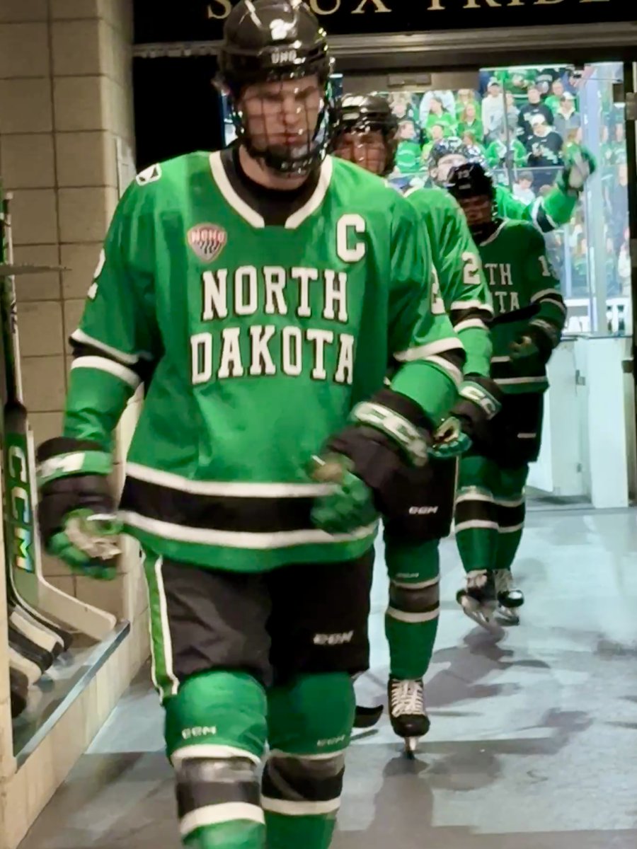 TheREA's tweet image. Only a few hours left in the Kids Takeover UND Hockey Jersey auction! Jerseys feature each player's childhood nickname, commemorative patch and were worn in warmups last Friday night. Proceeds benefit UND Hockey NIL.

Place your bids until 9 PM at: pd.undalumni.org/jersey