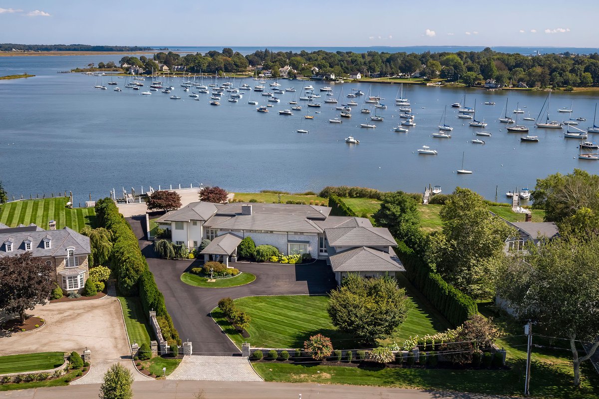 20 Saltus Drive in Old Saybrook sits right on the water, where mornings begin with soft light over the Sound and evenings end with that golden coastal glow. It’s refined without trying too hard, private without feeling isolated, and designed for the kind of everyday living that