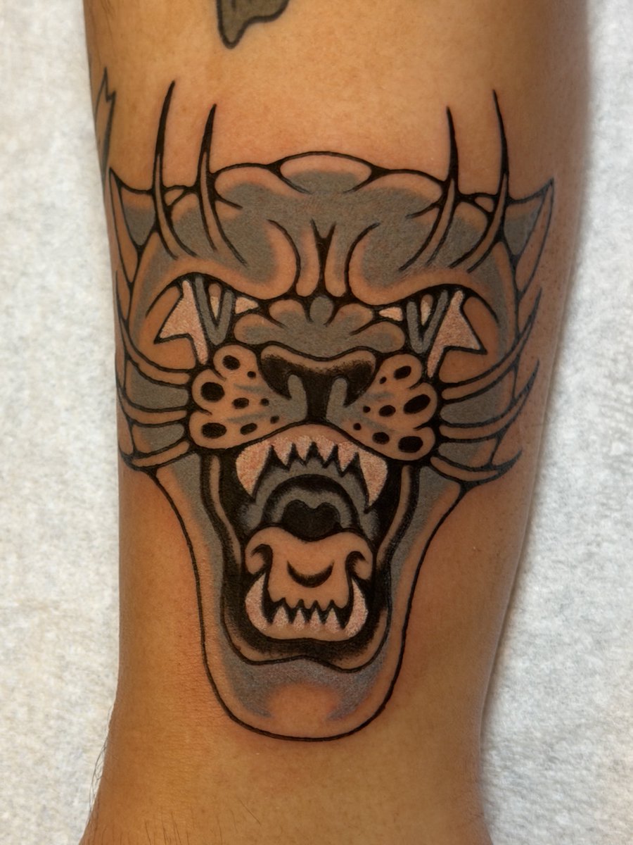 Fun black and grey starry-eyed panther head! This is an old design that I got to update and tattoo today!