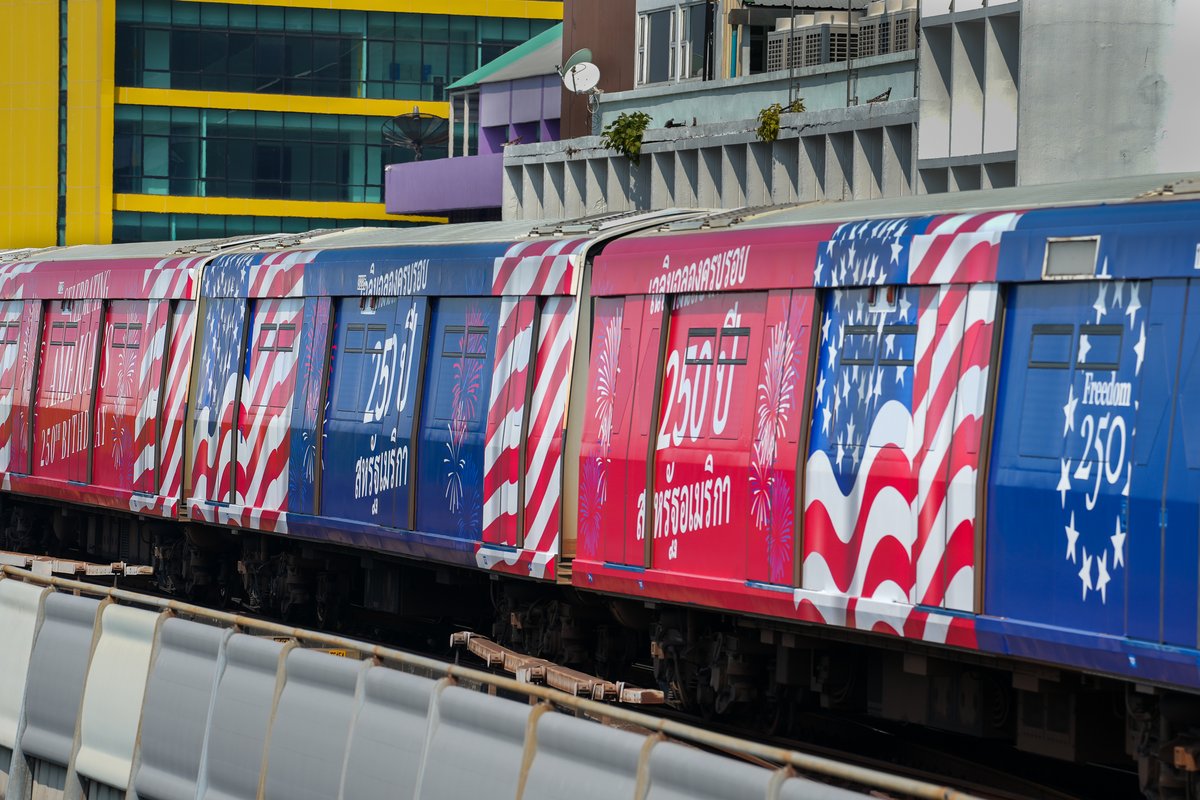 USEmbassyBKK's tweet photo. The U.S. Embassy in Bangkok launched the “Freedom 250” BTS Skytrain wrap on February 10, 2026, at Phrom Phong BTS Station. This vibrant mobile tribute commemorates the 250th anniversary of the signing of the U.S. Declaration of Independence and will traverse Bangkok’s premier transit network on the Sukhumvit Green Line for one month from February 10-March 9, 2026.

U.S. Ambassador Sean K. O’Neill officially inaugurated the wrap by boarding the specially designed train from Phrom Phong to Phloen Chit Station. The Ambassador invited the Thai public to participate in a year-long celebration of America’s rich history and the enduring strength of U.S.-Thai diplomacy.

We are grateful to our partner, Plan B Media, for making this project possible.

The U.S. Embassy Bangkok’s Freedom 250 project aims to share the story of the United States’ journey since 1776 and showcase the pivotal role of U.S. diplomacy in securing “peace through strength.” Follow our journey and stay tuned for the other upcoming Freedom 250 events at https://t.co/LaMeEFbqFd.