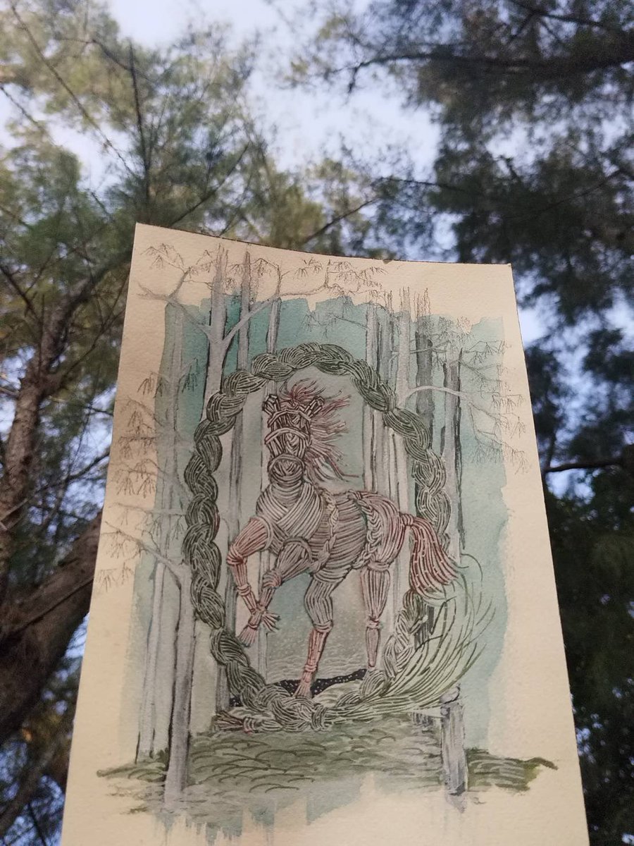 Happy Year of the Horse!🐴🎉
.
At my gate, along the tree lined driveway, fallen leaves of สนประดิพัทธ์, the horsetail tree, awaken as a horse. Woven from pale leaves, it rises gently, while a green braid forms an oval around it, like a living frame holding the spirit in place.