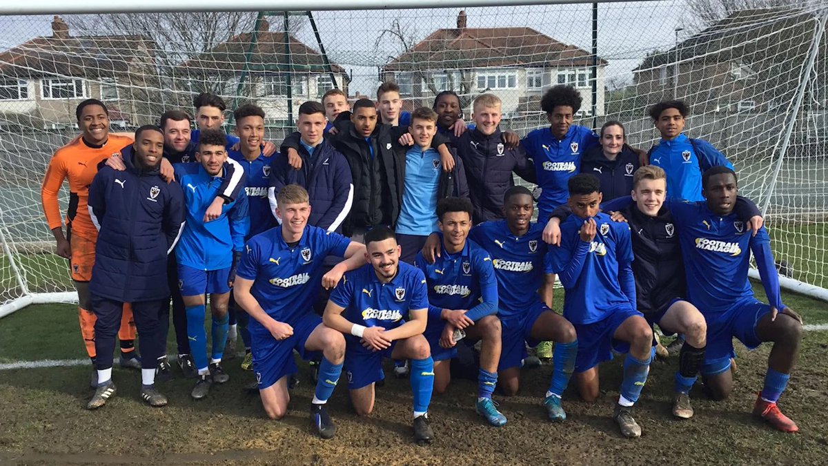 Dons_Sayer_WDON's tweet photo. ⏪ Six years ago our U18s beat Cambridge in the Youth Alliance Cup Southern Area Final, later they’d go on to beat Rotherham in the National Final. Spot Hus Biler, Ogs and Jack Currie among all that talent! This week, this season’s crop face Luton at the same stage #AFCW #COYD 🏆 https://t.co/Xqgrnptupy