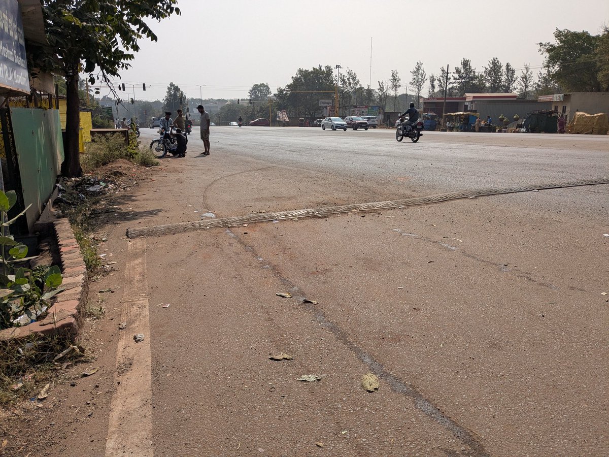 varungrao's tweet photo. Unscientific road humps on Hubballi-Dharwad BRTS mixed lane !!

None of these humps comply with Indian Roads Congress (IRC) standards that mention parabolic shape, height should be 0.1m and 3.7m width for an advised speed design of 25kmph. The humps on main roads are strictly limited as per IRC standards.

The authorities have installed the humps without following IRC standards.

As per the media reports, police advised BRTS Limited to put humps. But BRTS has put unscientific humps without marking, non parabolic that doesn't follow IRC standards.

These unscientific humps are a threat to the commuters. Unscientific hump has already taken two lives in Feb 2025 at Arts college junction.

The hard rubber hump at IOCL junction in Rayapur is the most dangerous hump. This hump can easily cause an imbalance to two wheelers. (Pic 2)

I request the concerned authorities to correct these unscientific humps and make it as per IRC standards.

@compolhdc @HDCityTraffic @hd_brts 

FYI @osd_cmkarnataka