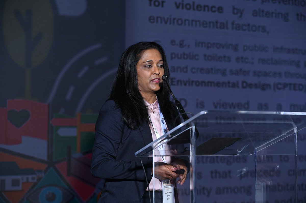 SALGA_Gov's tweet photo. Ms Ugeshni Naidoo presents on the integrated community safety model to combat GBVF, emphasizing that "community safety is not an add-on, it's a developmental imperative." 
#SALGA #SWC2026 #Letsema https://t.co/TPNKkfMfuL