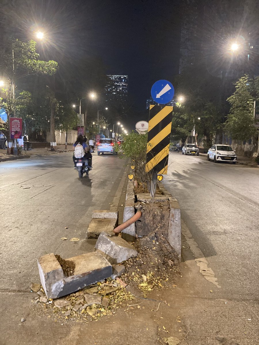 vernonsequeira's tweet photo. @mybmcWardGS @mybmc please get this fixed asap it’s quite difficult to use this road with those slabs lying around in the middle of the road. It may cause an accident do which is waiting to happen. 

Location: Near MuSo, Pandurang Budhkar Marg, Worli https://t.co/Abnjpg6dSc